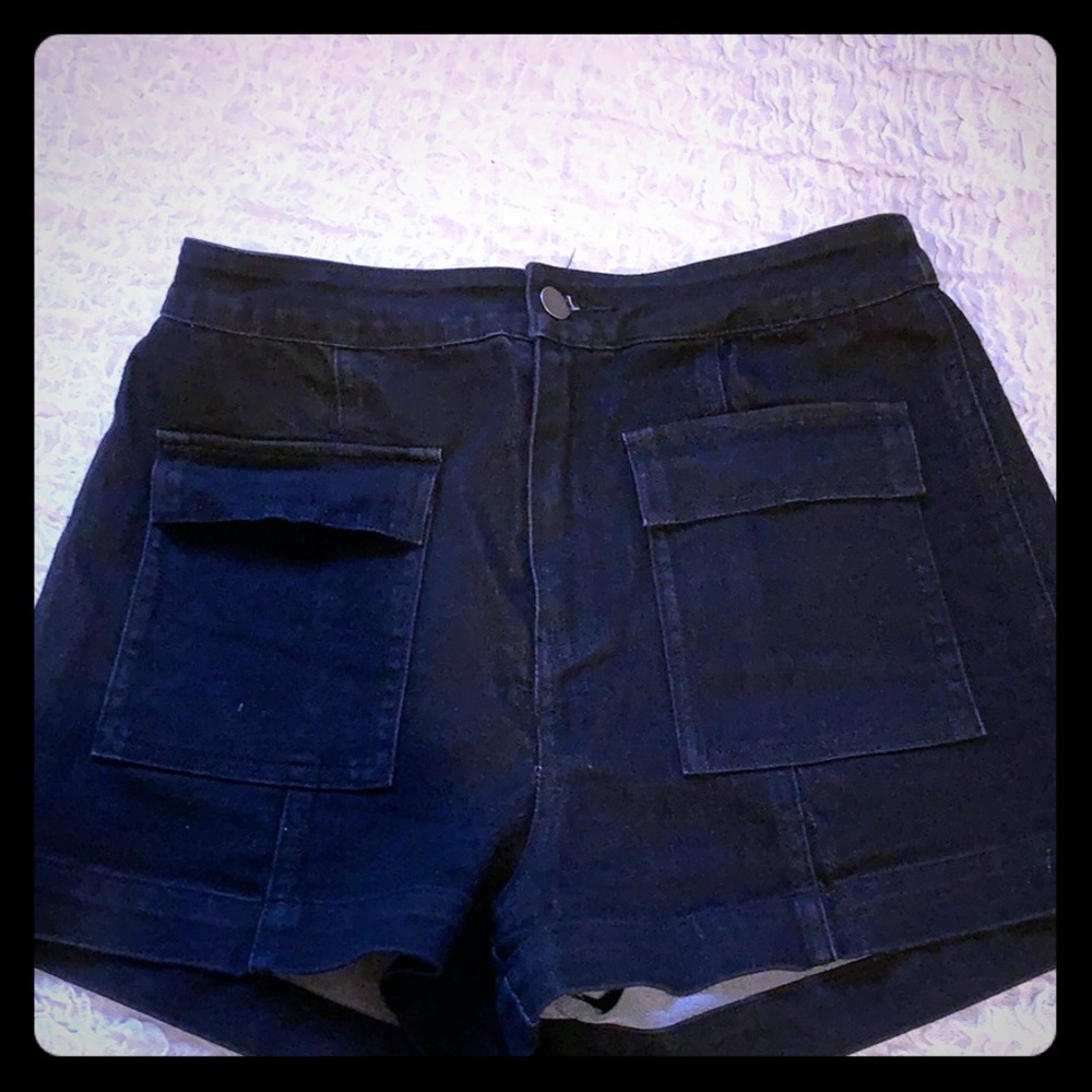 High waisted black shorts.